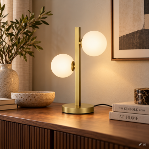 Złota lampa stołowa ze szklanymi kulami