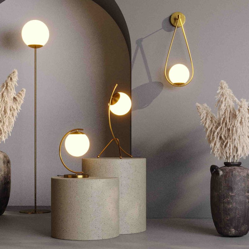 Złoty kinkiet z białą kulą nowoczesny luksuowy